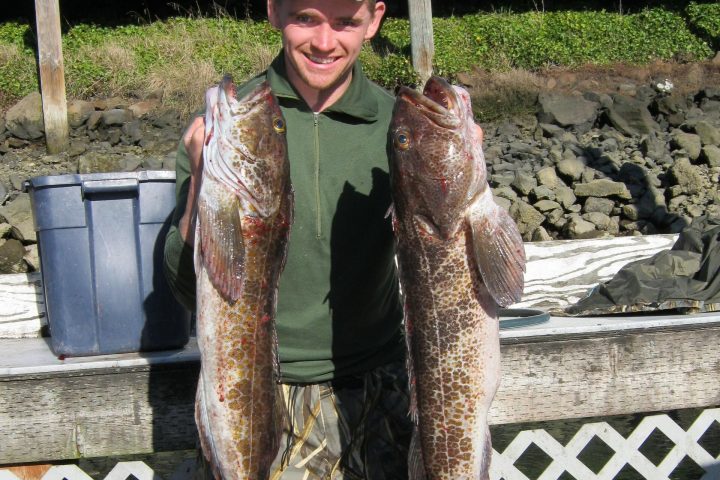 a person holding a fish