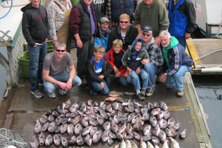 a group of people standing in front of a crowd